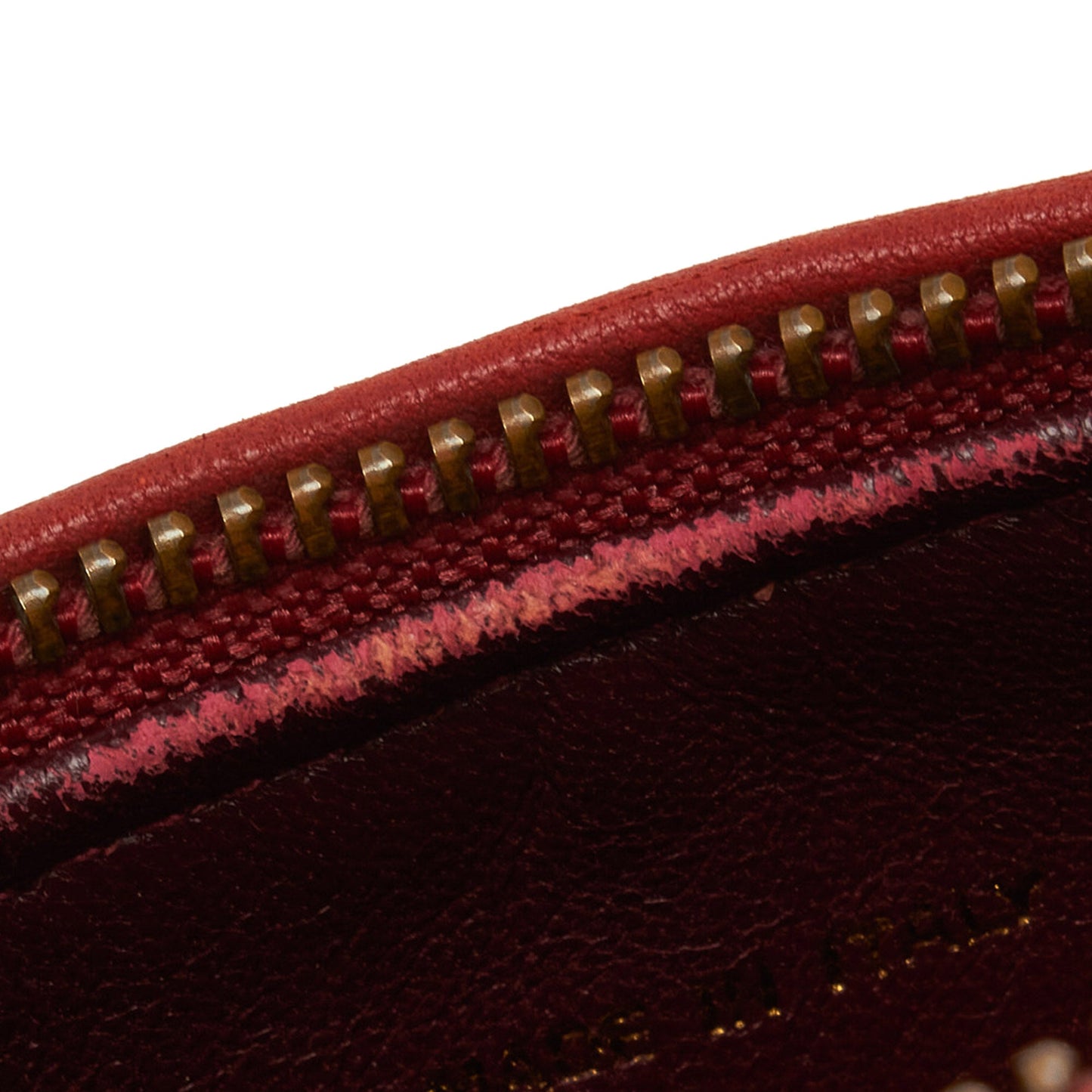 Chanel sac Ã  bandouliÃ¨re rond rouge matelassÃ© Ã  franges et pompons