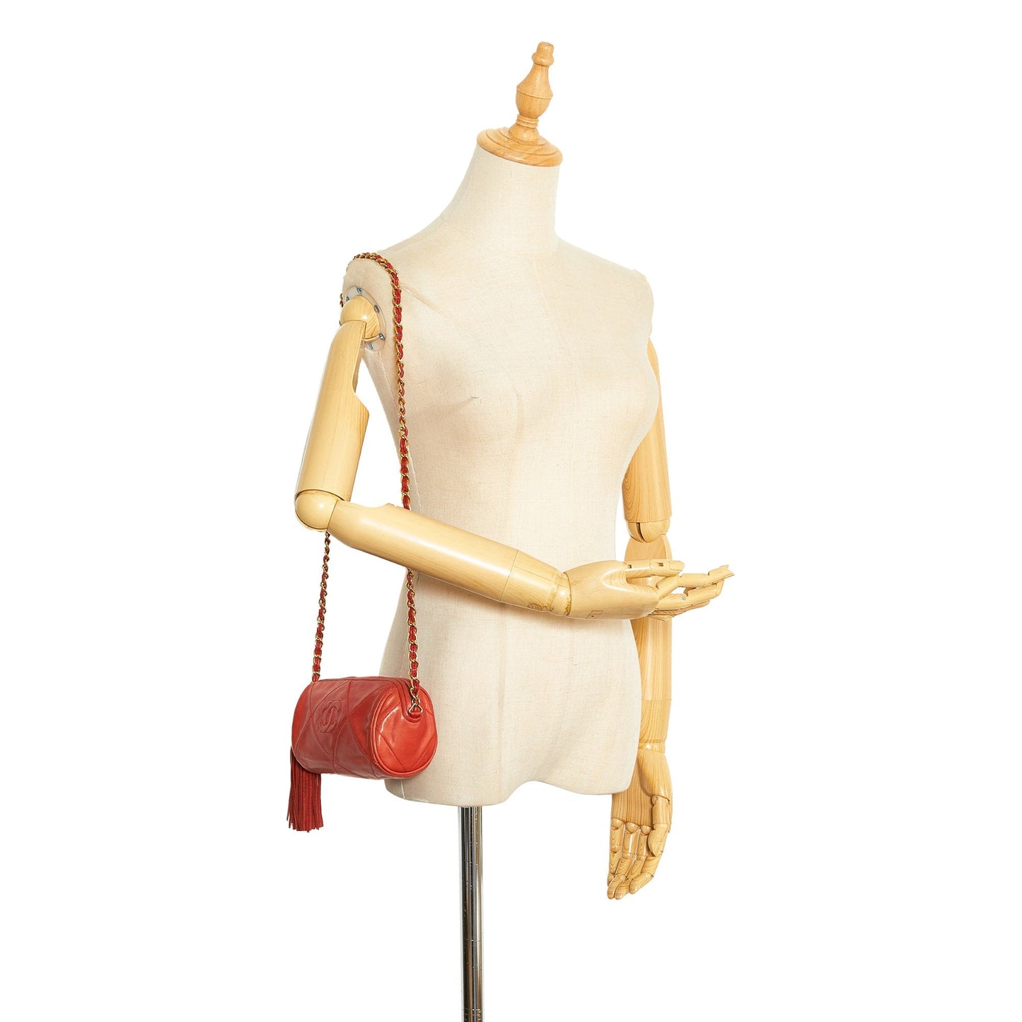 Chanel sac Ã  bandouliÃ¨re rond rouge matelassÃ© Ã  franges et pompons