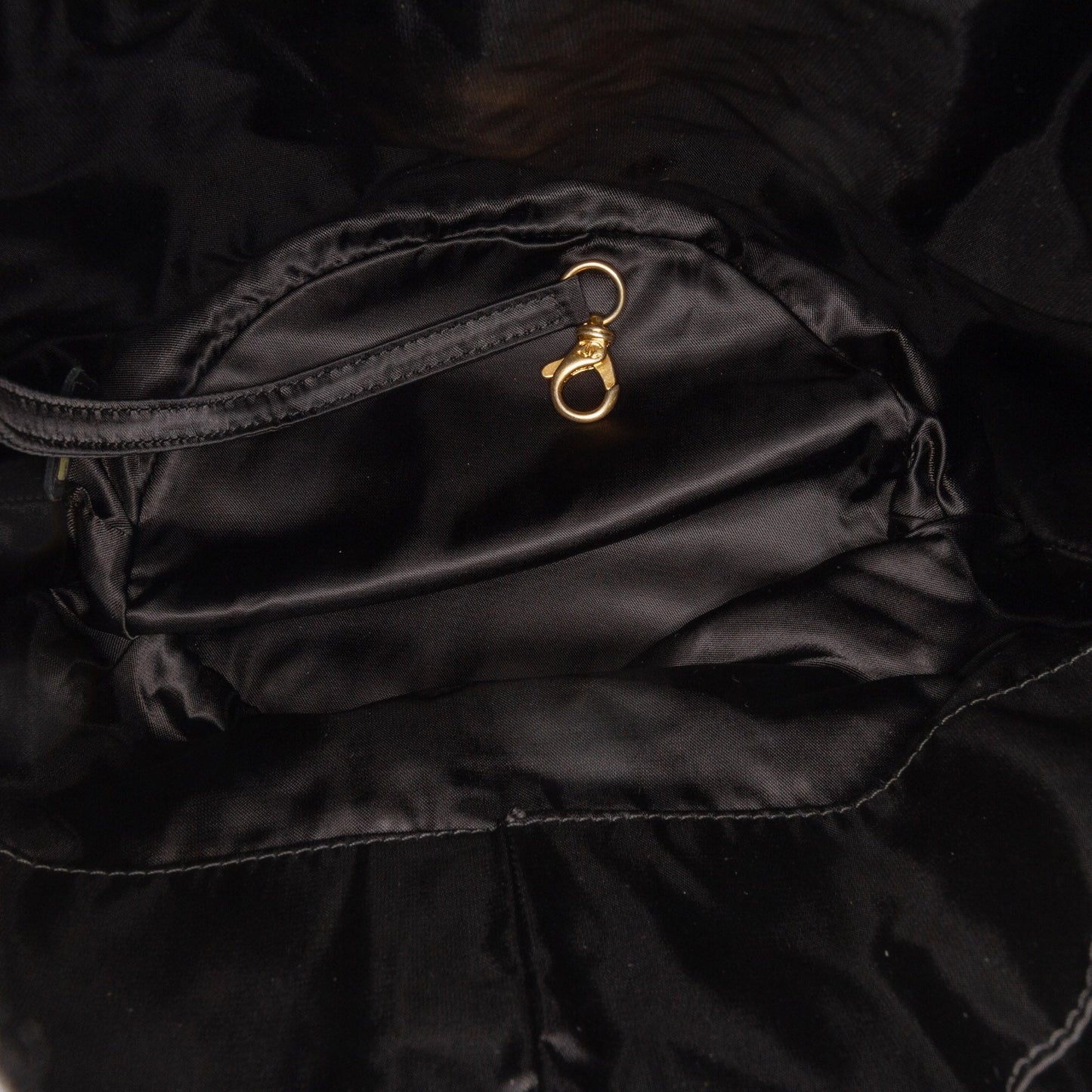Chanel Quilted Nylon Crystal CC Drawstring Sling Bag Black