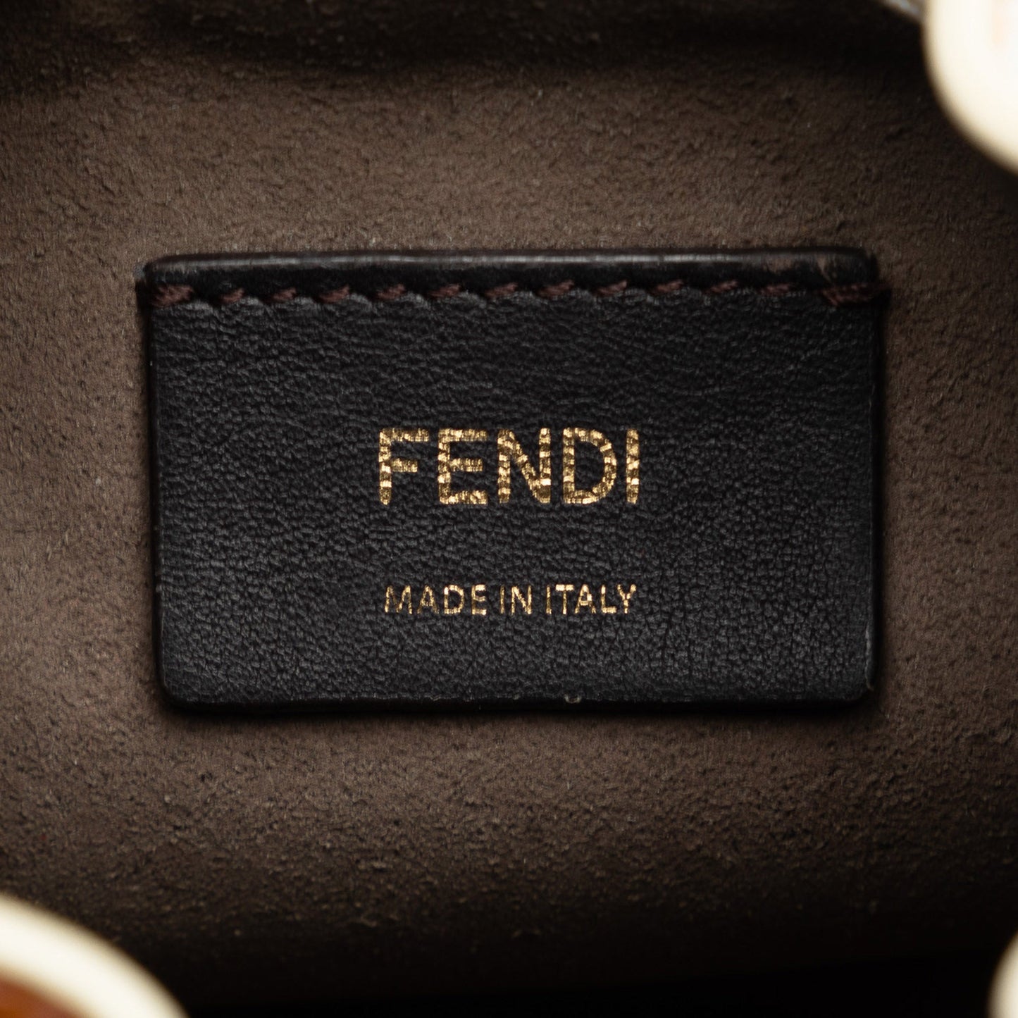 Fendi FF Embossed Striped Mini Mon Tresor Bucket Bag Brown