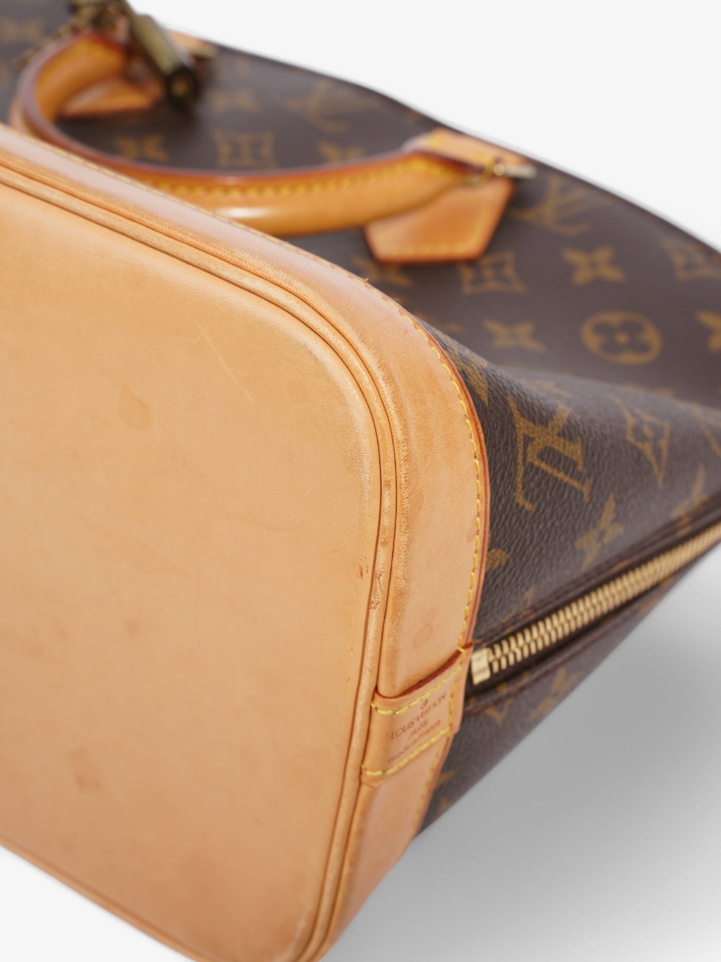 Louis Vuitton Alma Monogram Coated Canvas PM