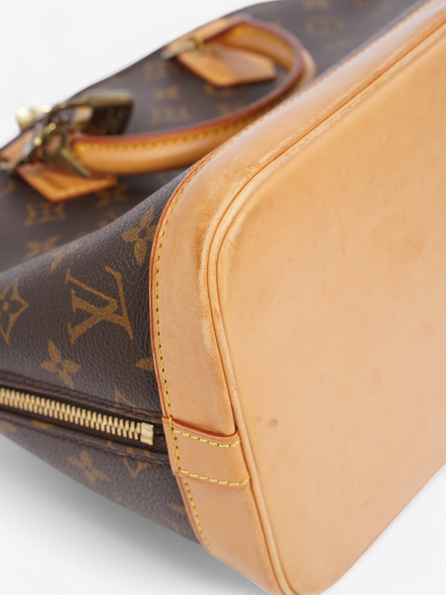 Louis Vuitton Alma Monogram Coated Canvas PM