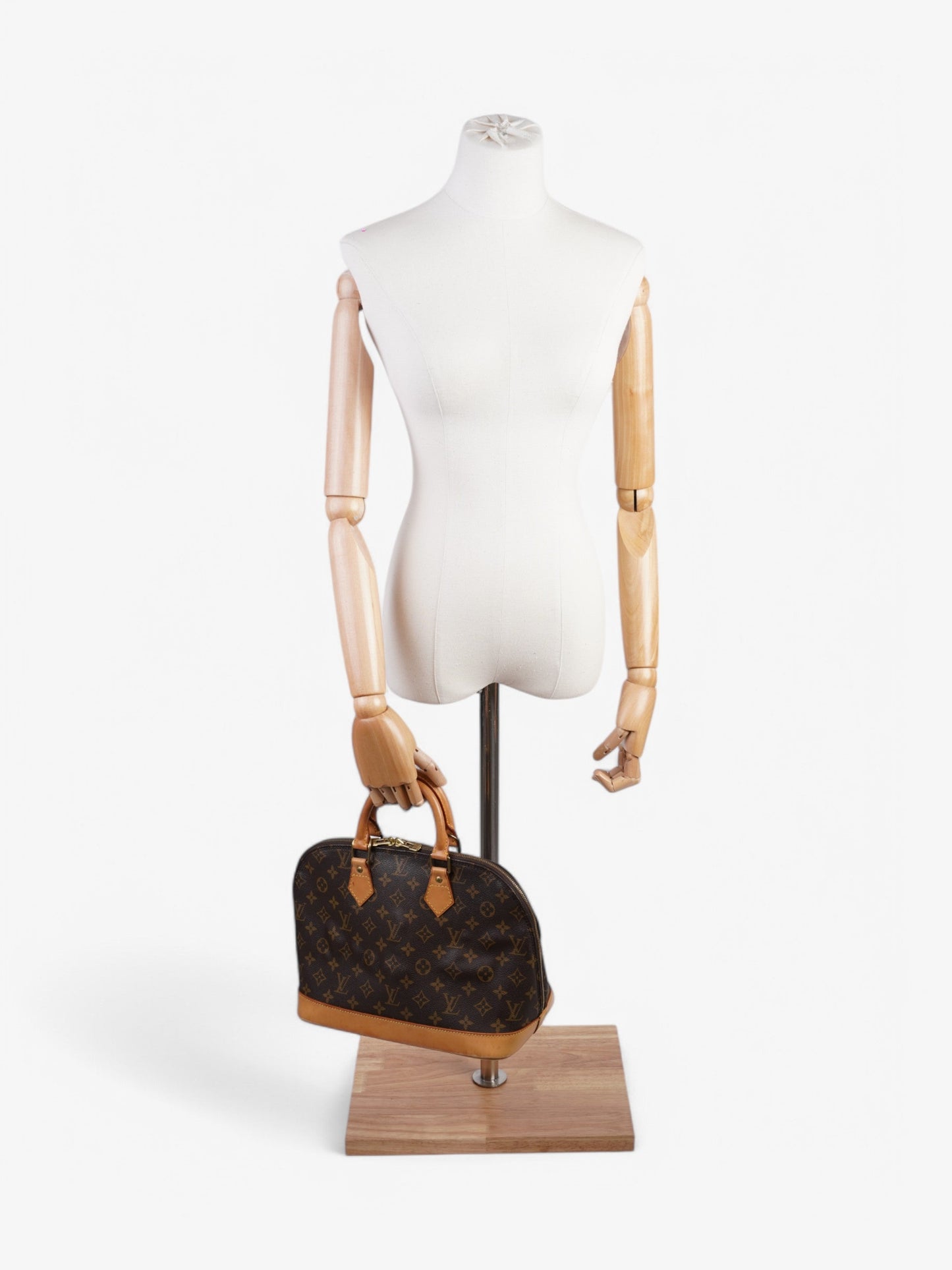Louis Vuitton Alma Monogram Coated Canvas PM